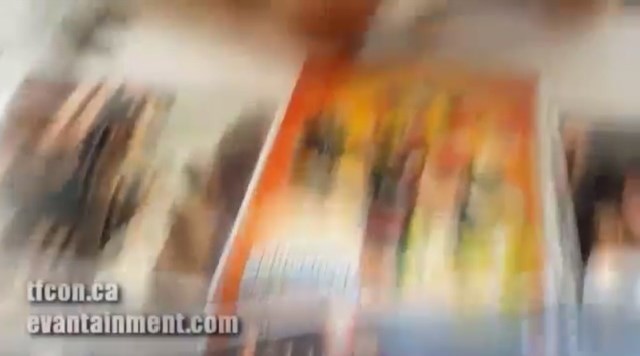 A blurred version of a Magna Charge autograph by Gregg Berger.